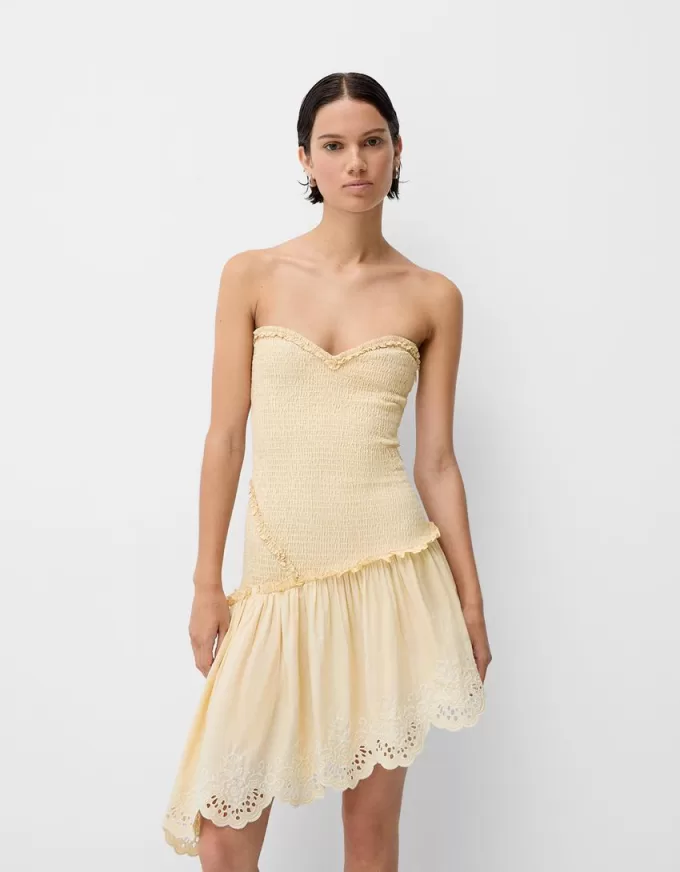 Asymmetric dress with shirred elastic detail Asymmetric dress with shirred elastic detail