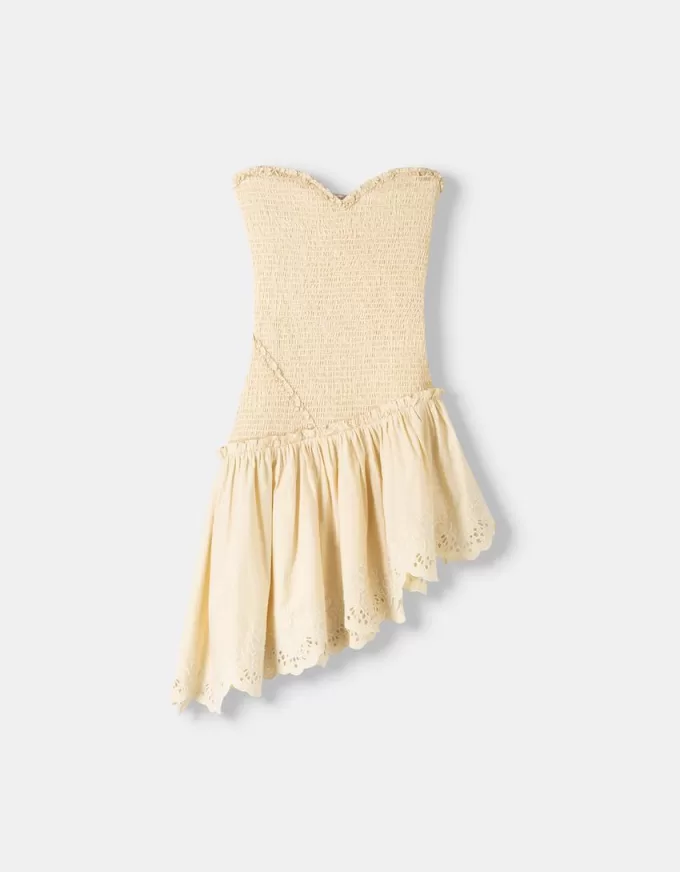 Asymmetric dress with shirred elastic detail Asymmetric dress with shirred elastic detail