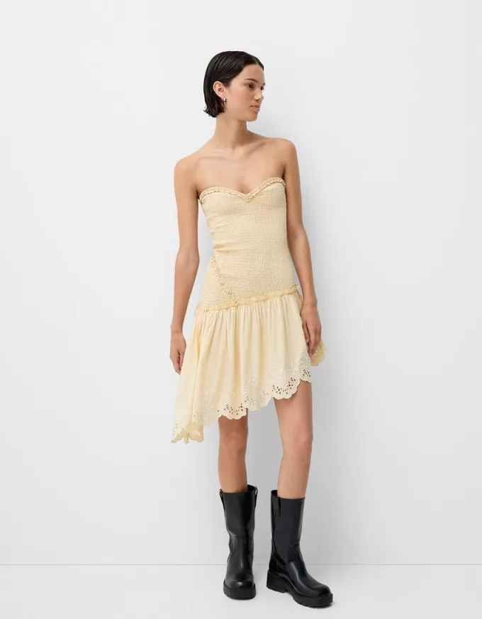 Asymmetric dress with shirred elastic detail Asymmetric dress with shirred elastic detail