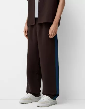 Baggy pants with side stripes