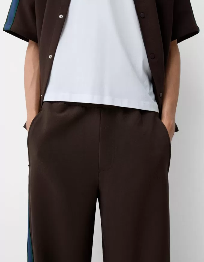 Baggy pants with side stripes Baggy pants with side stripes