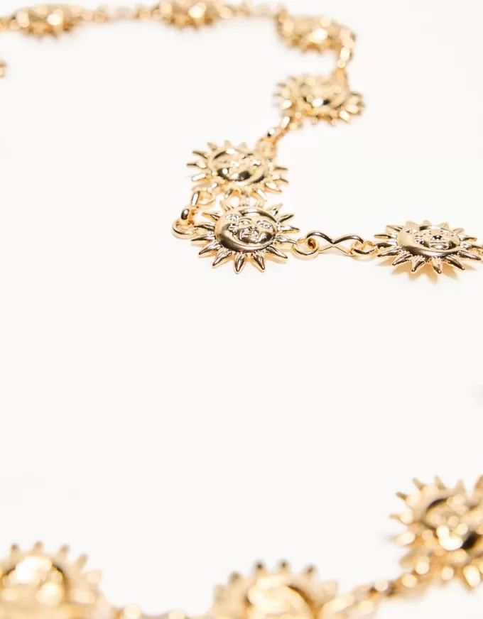 Belt with chain trim Belt with chain trim