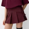 Box pleat mini skirt with bow detail Box pleat mini skirt with bow detail