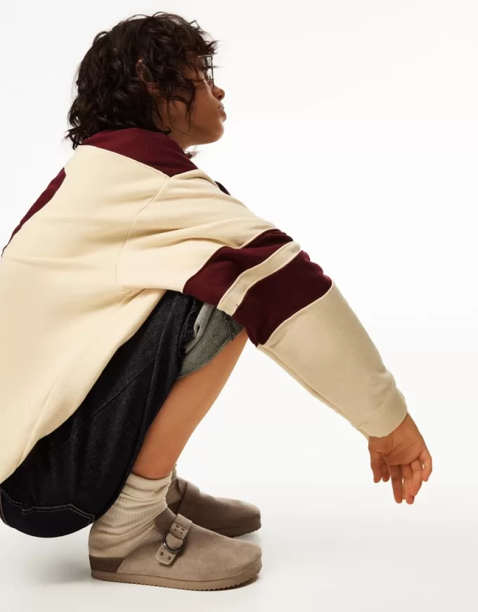 Buckled clogs with stud details