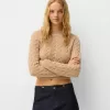 Cable-knit chenille sweater