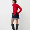 Cable-knit polo collar sweater