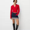 Cable-knit polo collar sweater