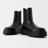 Chelsea boots with track soles Chelsea boots with track soles