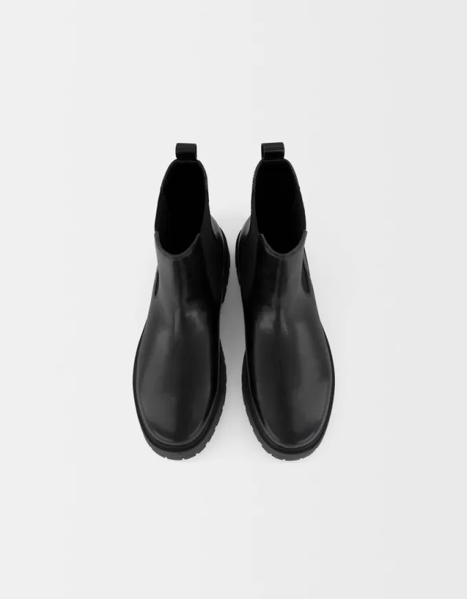 Chelsea boots with track soles Chelsea boots with track soles