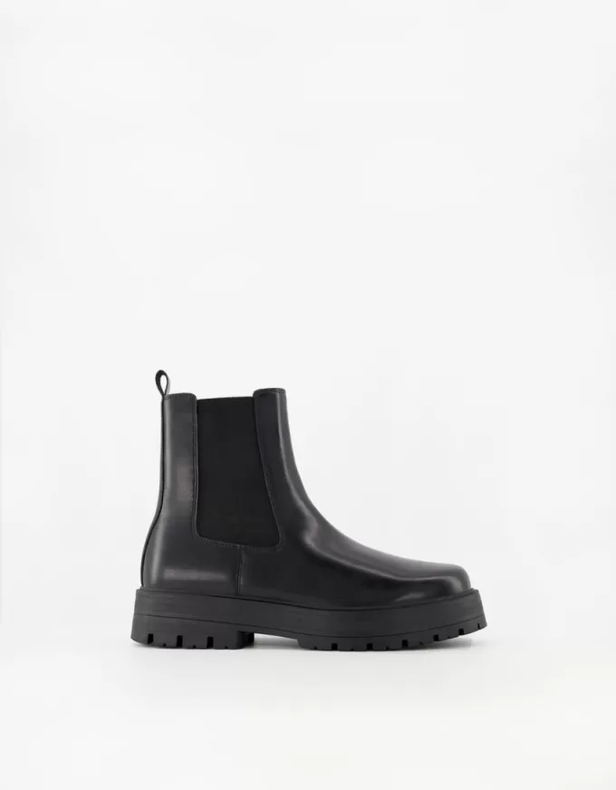 Chelsea boots with track soles Chelsea boots with track soles