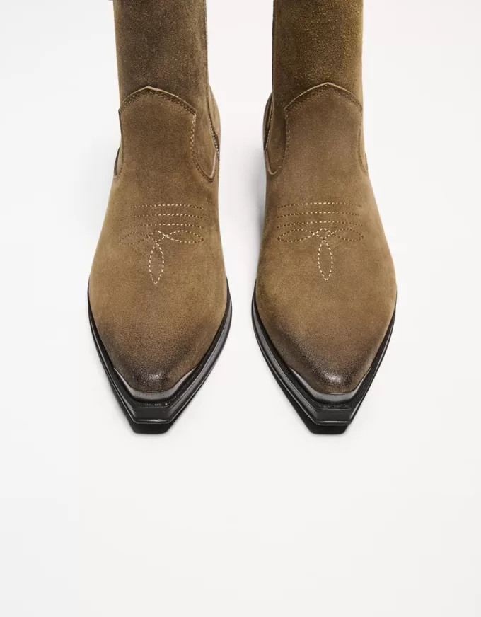 Cowboy ankle boots with metallic toe Cowboy ankle boots with metallic toe