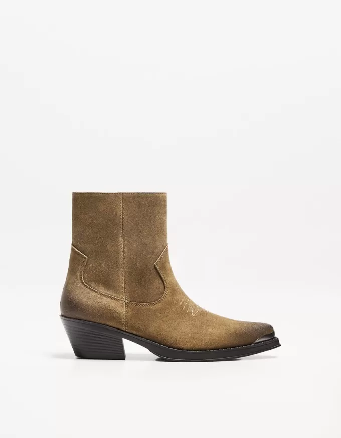 Cowboy ankle boots with metallic toe Cowboy ankle boots with metallic toe