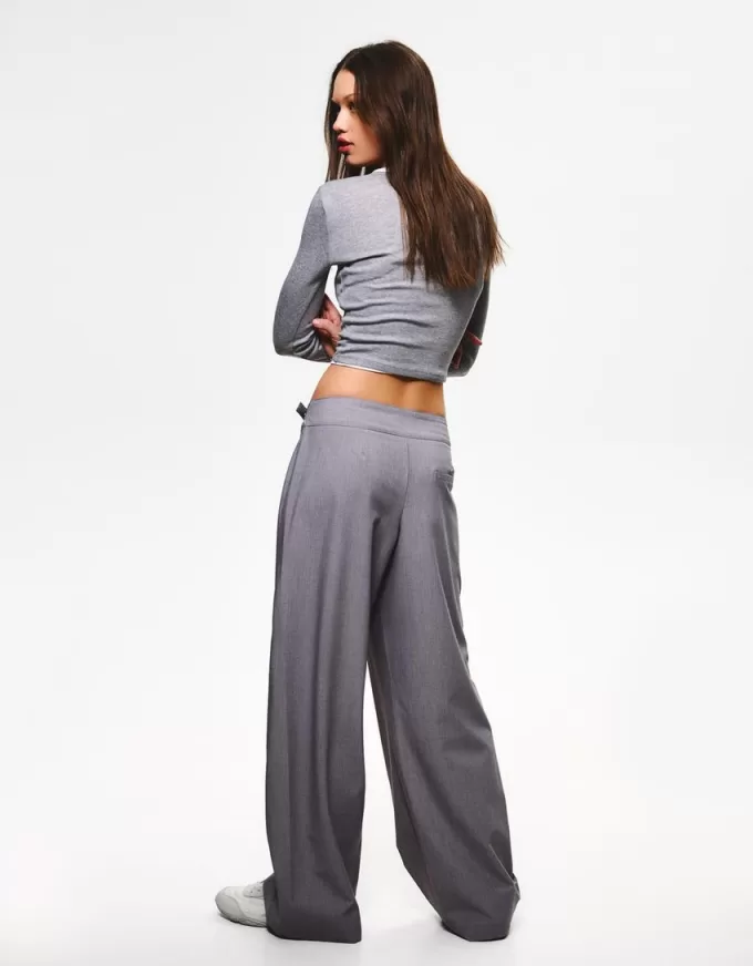 Darted pants with buckle Darted pants with buckle