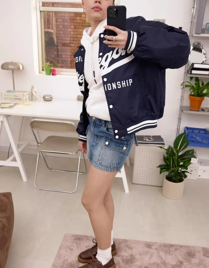 Denim cargo skirt with straps