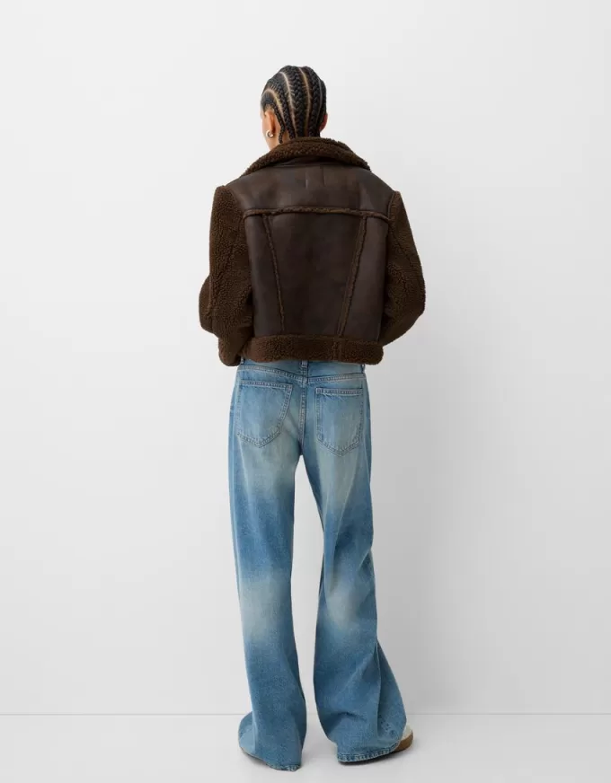 Double-sided jacket with faux shearling sleeves Double-sided jacket with faux shearling sleeves