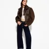 Double-sided jacket with faux shearling sleeves Double-sided jacket with faux shearling sleeves