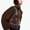 Double-sided jacket with faux shearling sleeves Double-sided jacket with faux shearling sleeves