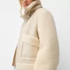 Double-sided jacket with faux shearling sleeves Double-sided jacket with faux shearling sleeves
