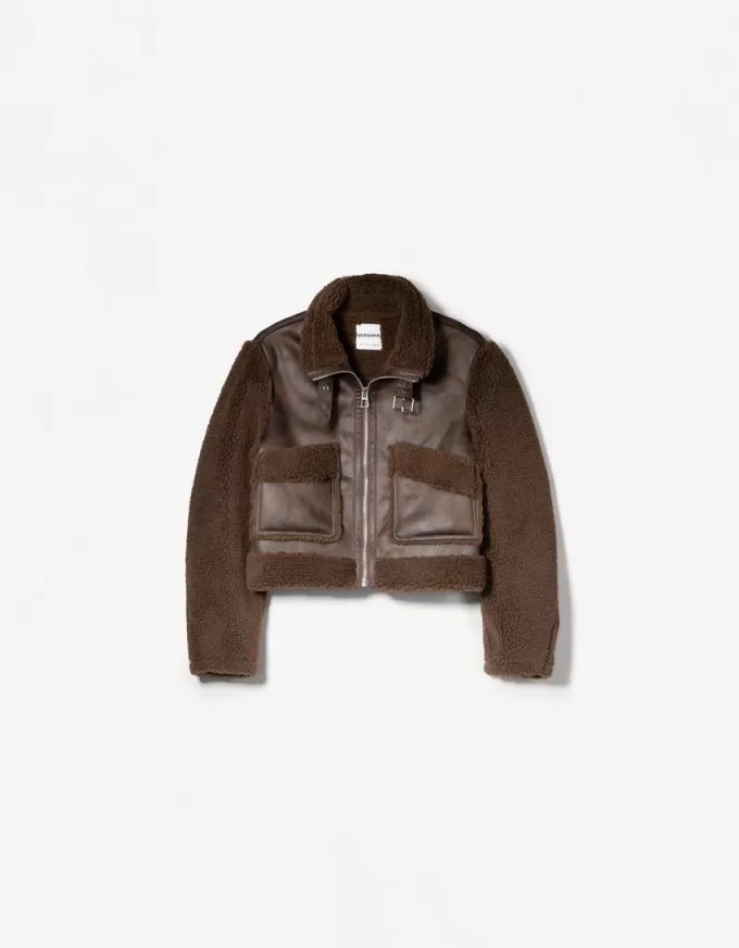 Double-sided jacket with faux shearling sleeves Double-sided jacket with faux shearling sleeves
