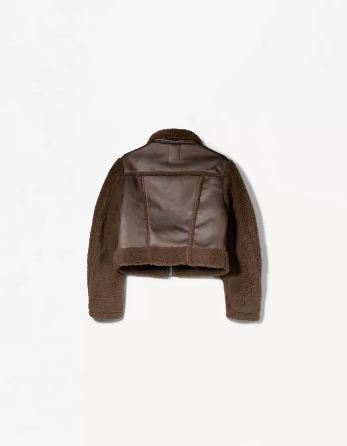 Double-sided jacket with faux shearling sleeves Double-sided jacket with faux shearling sleeves