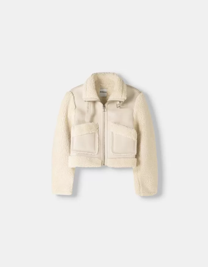 Double-sided jacket with faux shearling sleeves Double-sided jacket with faux shearling sleeves