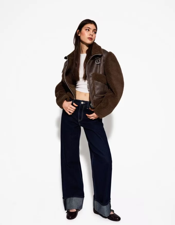 Double-sided jacket with faux shearling sleeves Double-sided jacket with faux shearling sleeves