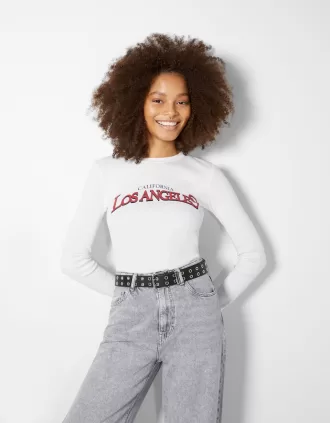 Faux leather belt with eyelets Faux leather belt with eyelets