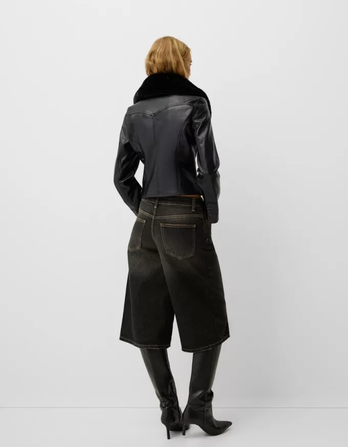 Fitted leather effect jacket with a sweatshirt material neck