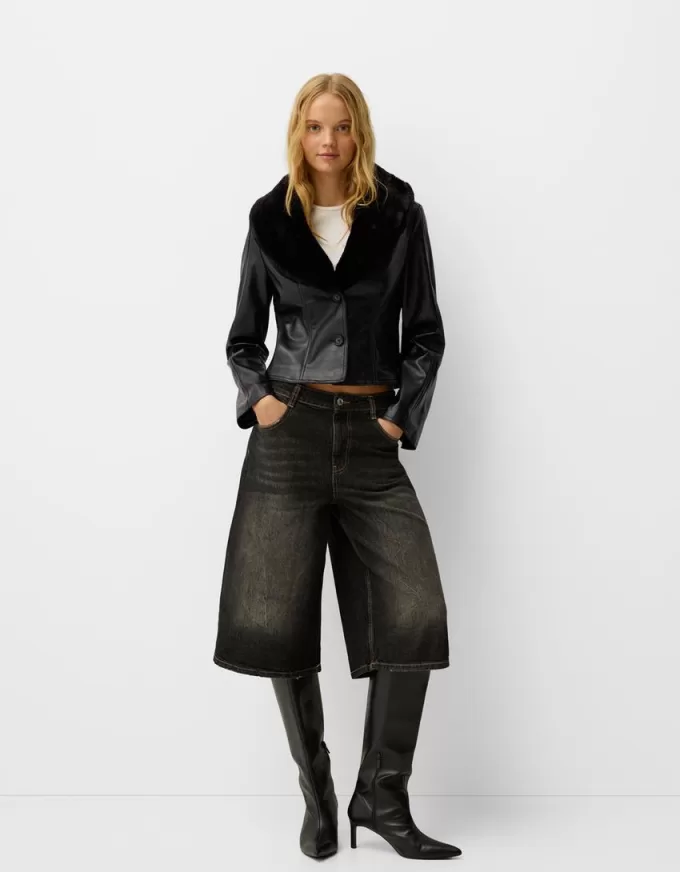 Fitted leather effect jacket with a sweatshirt material neck