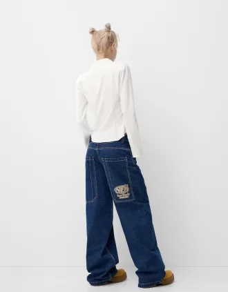 Fitted shirt with flared sleeves