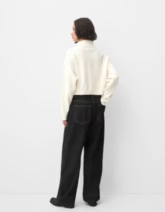 High neck sweater with wide sleeves