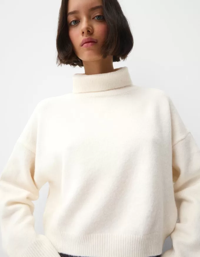 High neck sweater with wide sleeves High neck sweater with wide sleeves