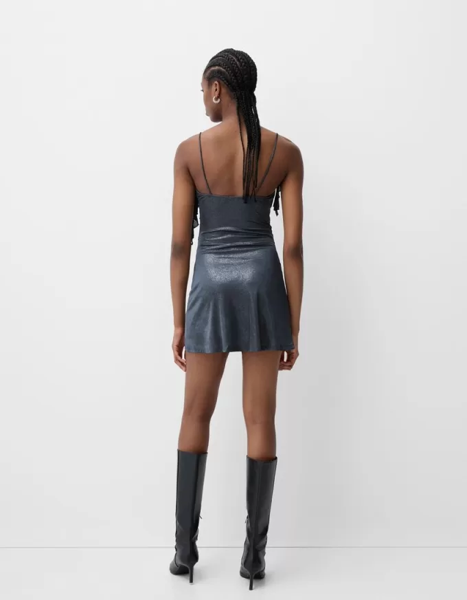 Mini dress with shiny straps Mini dress with shiny straps