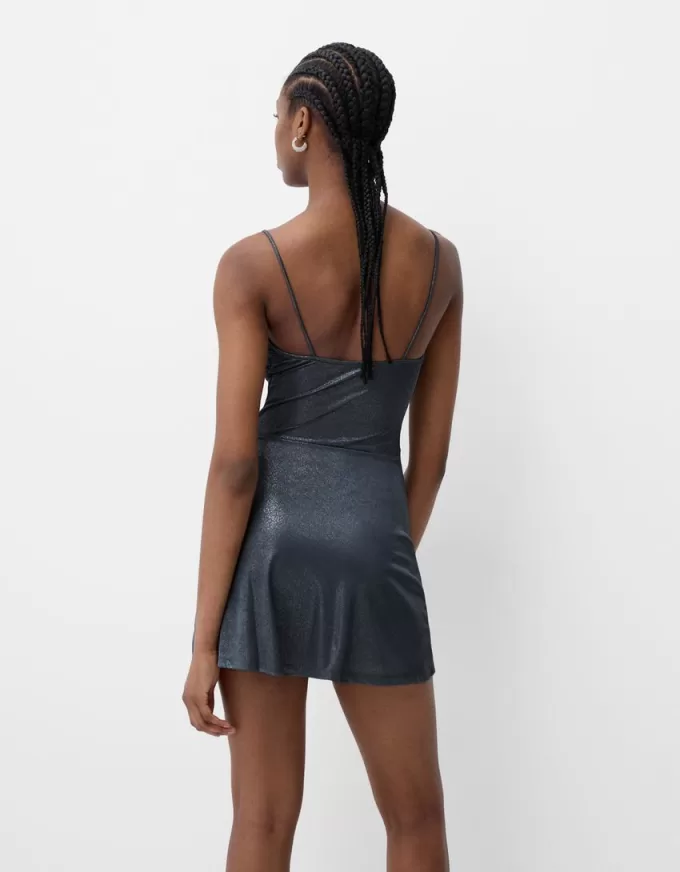 Mini dress with shiny straps Mini dress with shiny straps