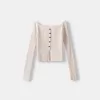 Open buttoned sweater with Bardot neckline Open buttoned sweater with Bardot neckline