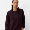 Oversize sweatshirt with side pockets