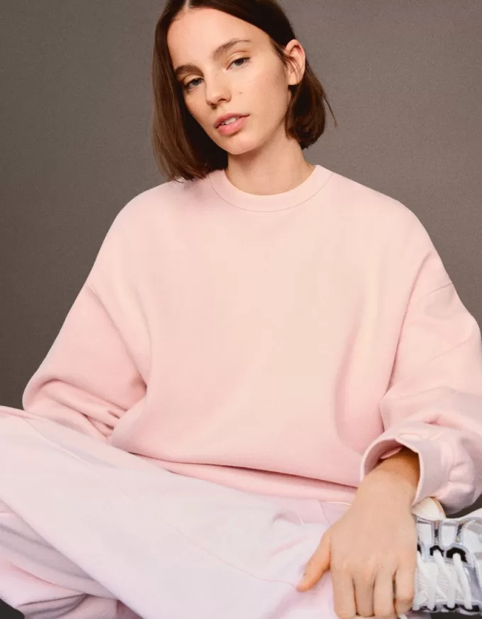 Oversize sweatshirt with side pockets