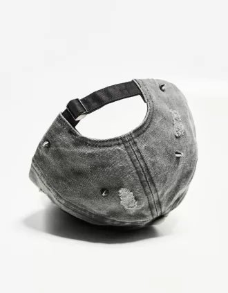 Piercing cap with eyelets