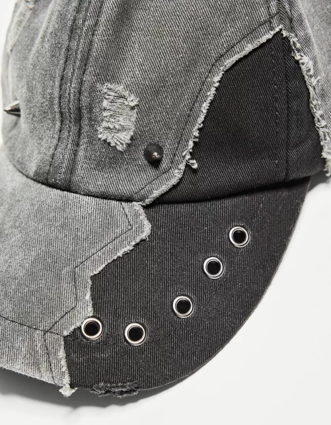 Piercing cap with eyelets Piercing cap with eyelets