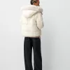 Puffer jacket with faux fur hood