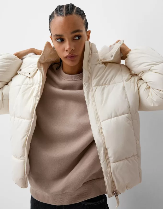 Puffer jacket with faux fur hood