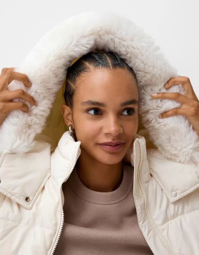 Puffer jacket with faux fur hood