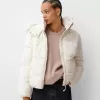 Puffer jacket with faux fur hood