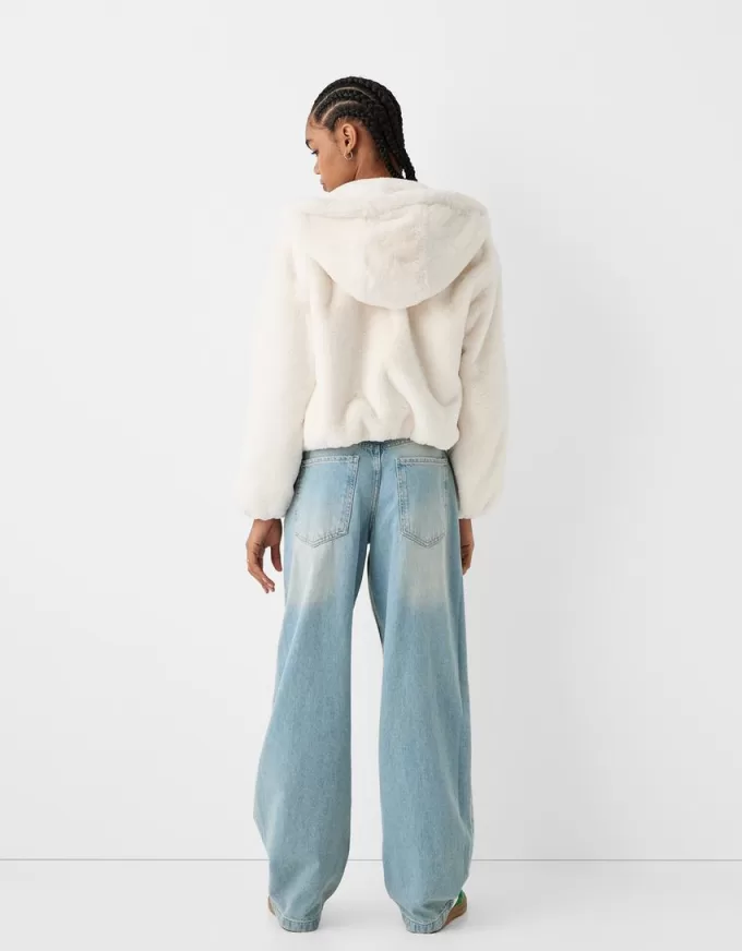 Quilted jacket with faux fur hood Quilted jacket with faux fur hood