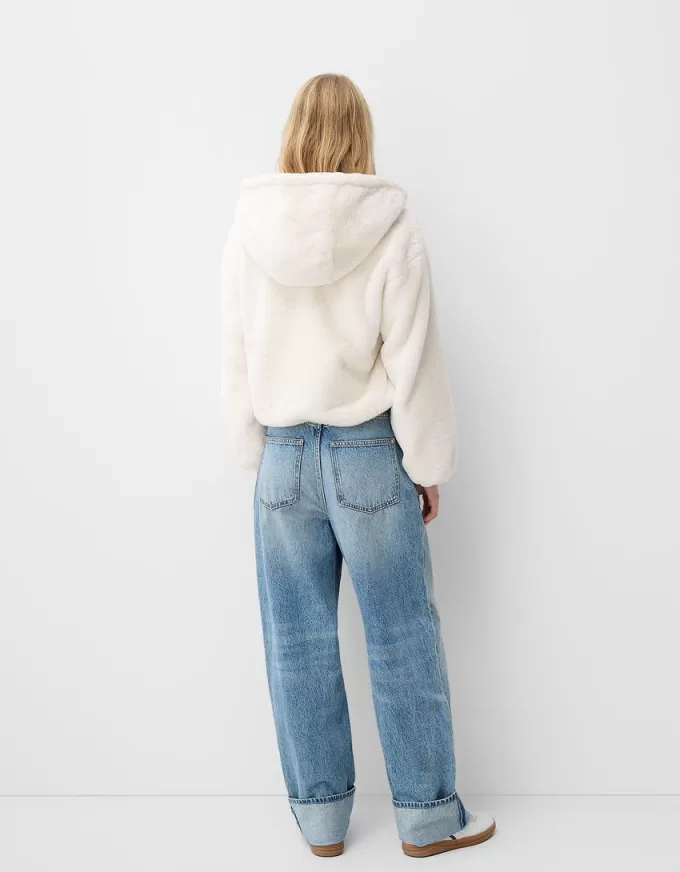 Quilted jacket with faux fur hood