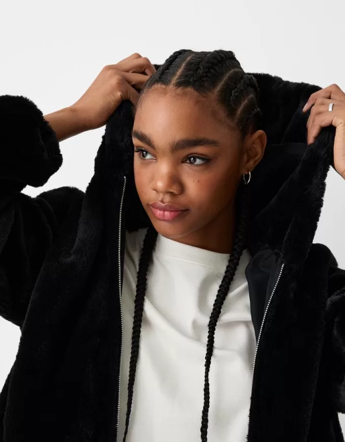 Quilted jacket with faux fur hood Quilted jacket with faux fur hood