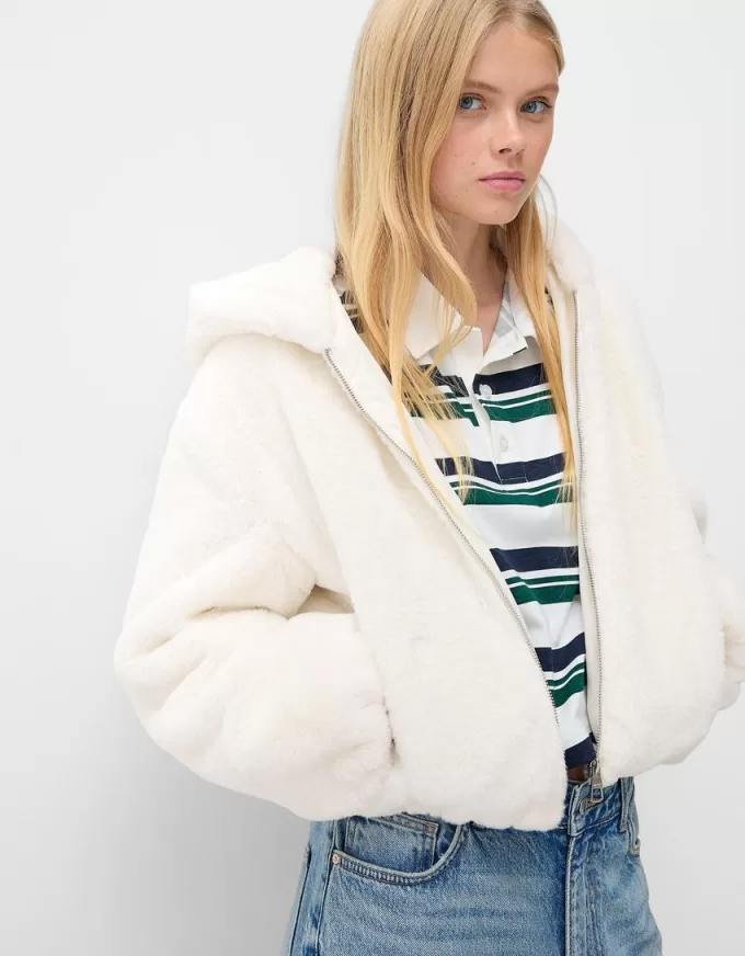 Quilted jacket with faux fur hood