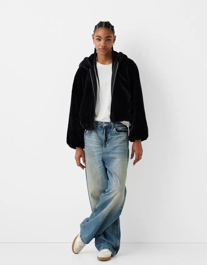 Quilted jacket with faux fur hood Quilted jacket with faux fur hood