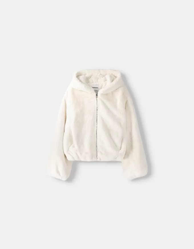 Quilted jacket with faux fur hood