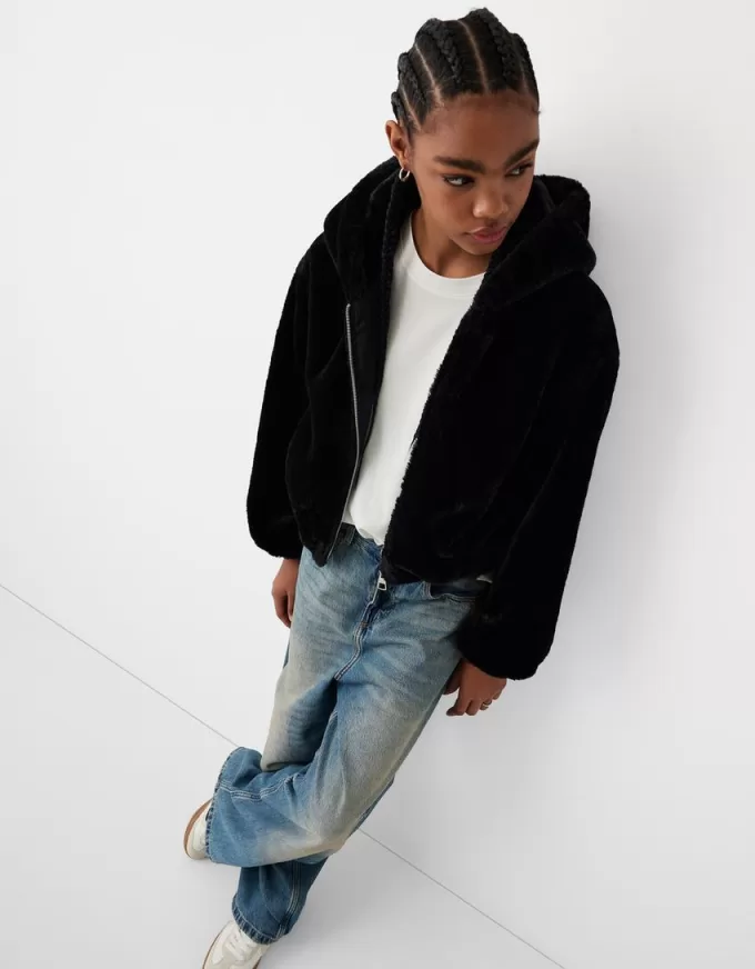 Quilted jacket with faux fur hood Quilted jacket with faux fur hood